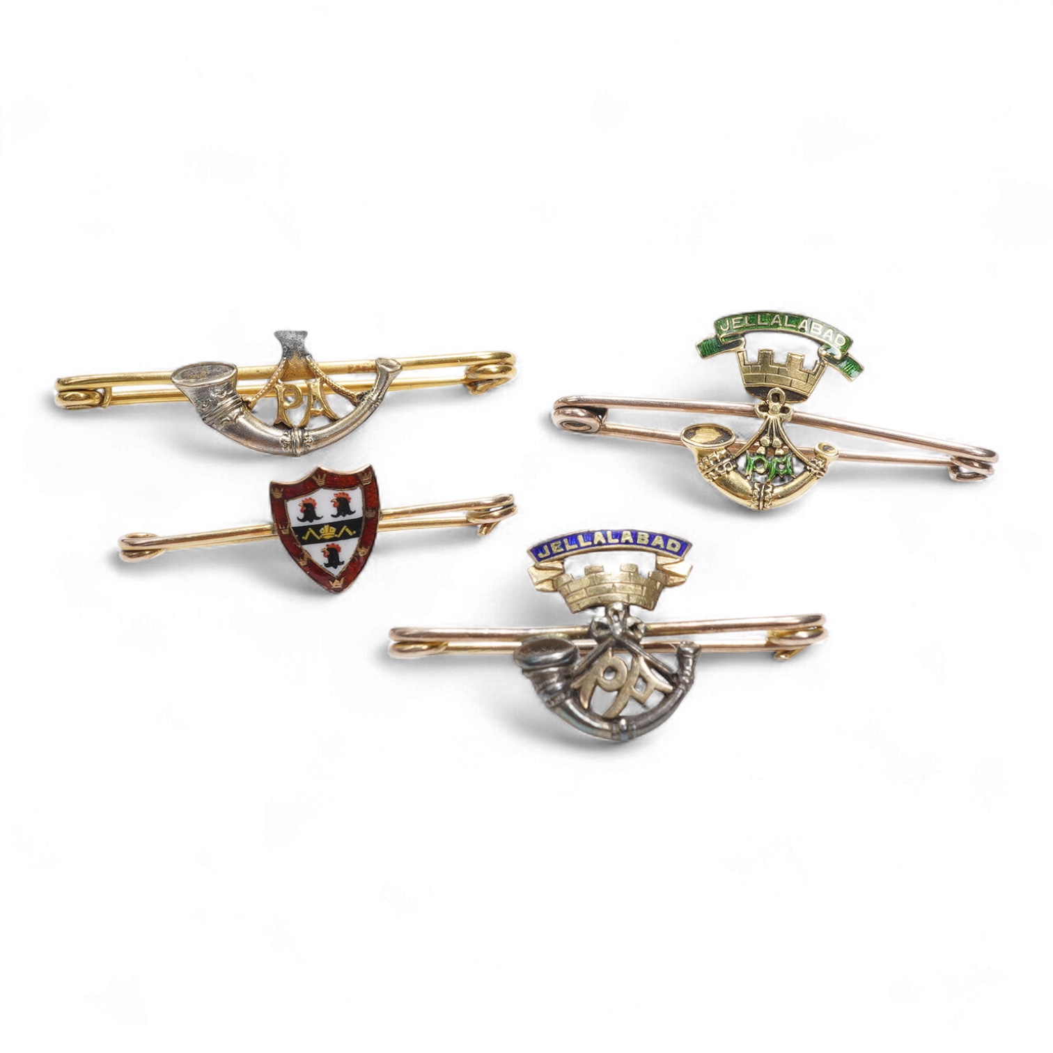 Four sweetheart type brooches; a hallmarked 9ct gold example with an enamel coat of arms, together with three yellow metal military brooches; all Prince Albert’s Somerset Light Infantry, two with enamelled ‘Jellalabad PA